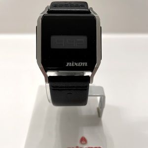 Nixon watch. The Atom style. Black leather band. Unisex watch.